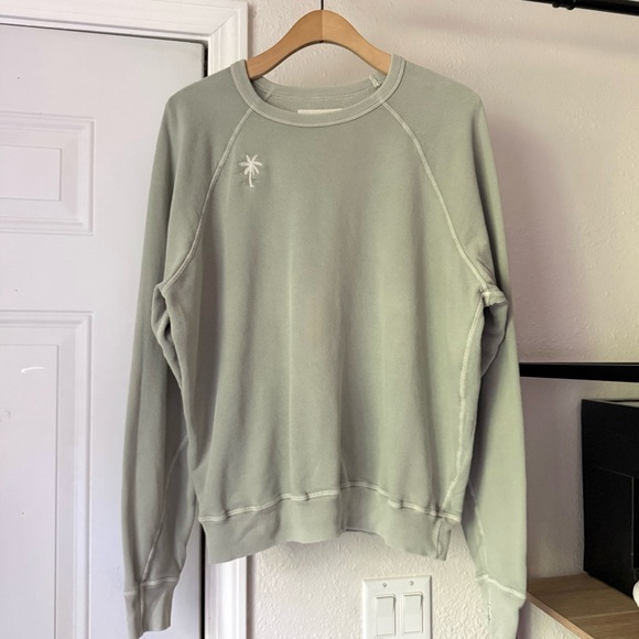 THE GREAT. Man sage green cotton terry boxy cropped Palm tree raglan sweater